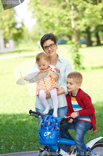 Image of happy young family in park
