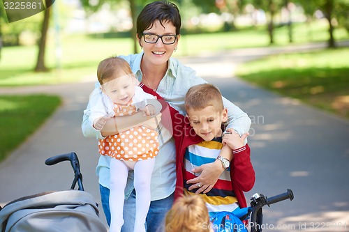 Image of happy young family in park