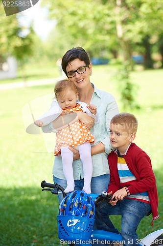 Image of happy young family in park