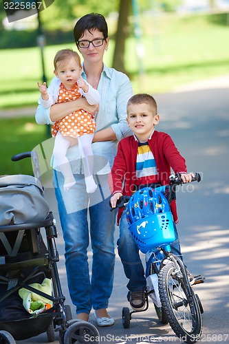 Image of happy young family in park