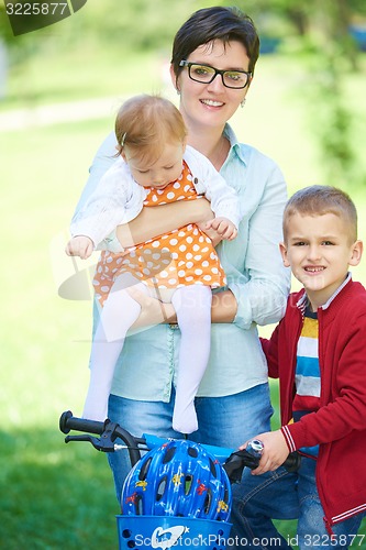 Image of happy young family in park