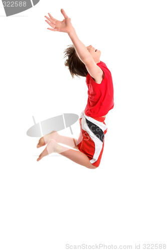 Image of Leaping child hands stretched to sky