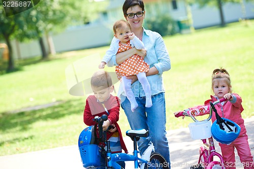Image of happy young family in park