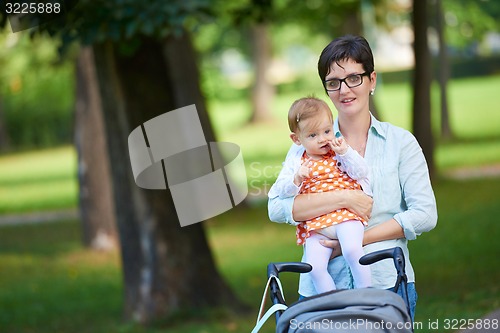 Image of mom and baby in nature