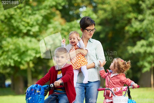 Image of happy young family in park