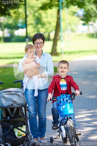 Image of happy young family in park