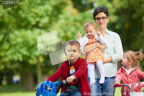 Image of happy young family in park