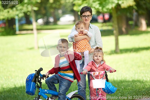 Image of happy young family in park