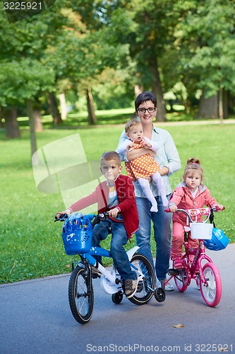 Image of happy young family in park