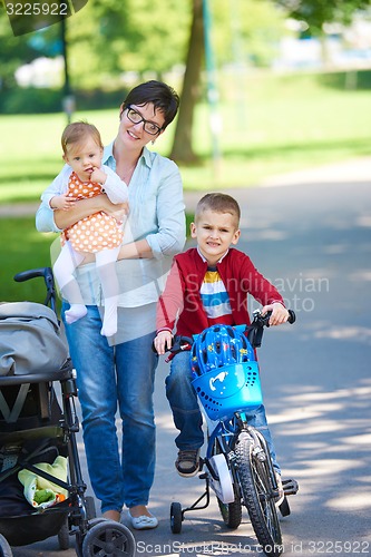 Image of happy young family in park