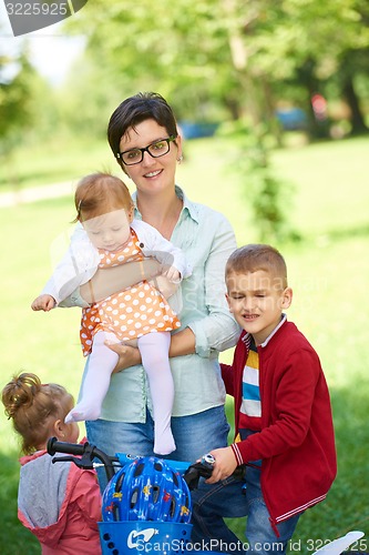 Image of happy young family in park