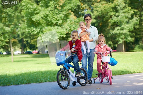 Image of happy young family in park