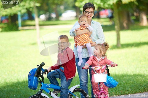 Image of happy young family in park