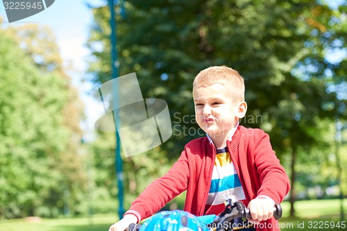 Image of boy on the bicycle at Park