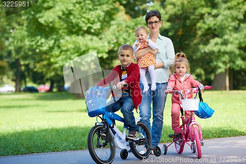 Image of happy young family in park