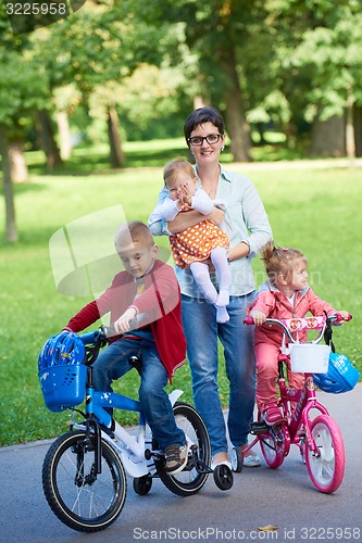 Image of happy young family in park