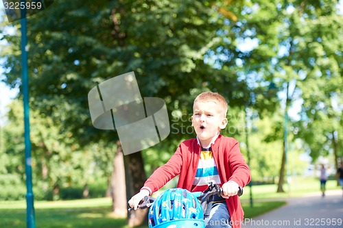 Image of boy on the bicycle at Park