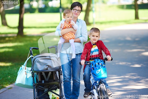 Image of happy young family in park