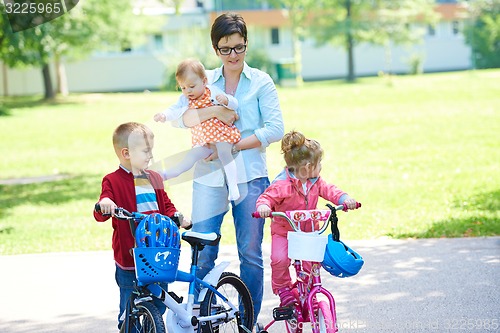 Image of happy young family in park