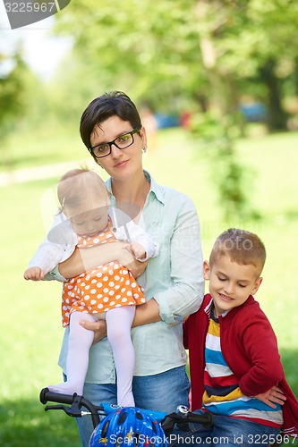 Image of happy young family in park