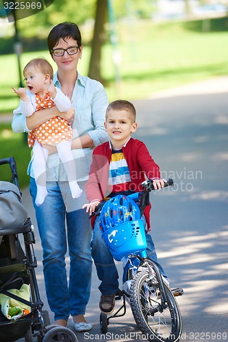 Image of happy young family in park