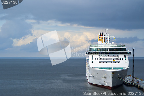 Image of White ferryboat in sea port