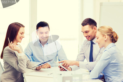 Image of happy team of architects and designers in office
