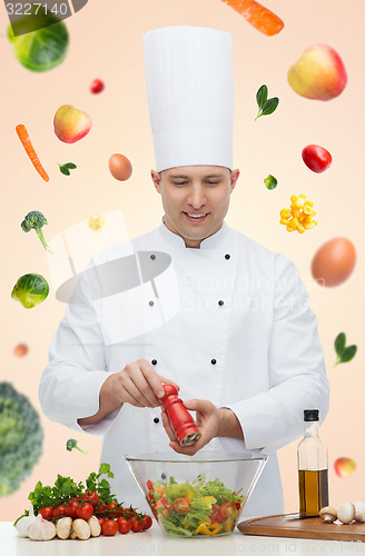 Image of happy male chef cook cooking food