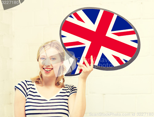 Image of smiling woman with text bubble of british flag