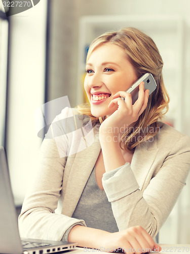 Image of businesswoman with cell phone