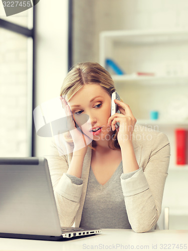 Image of businesswoman with cell phone