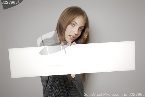 Image of girl with board