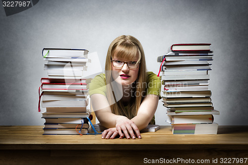 Image of Overworked female student