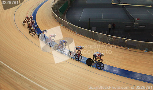 Image of bicycle race at racetrack tilt  shot