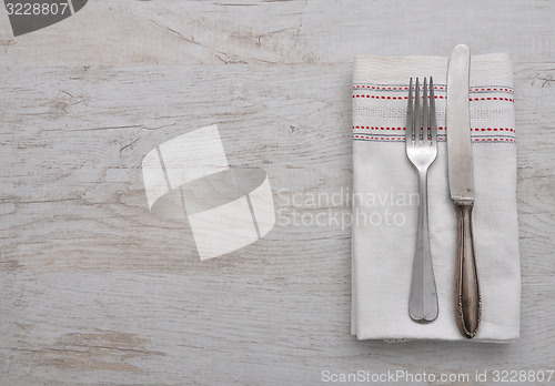 Image of Old cutlery on cloth