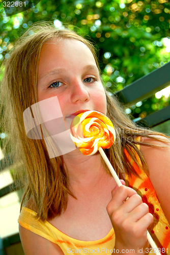 Image of Girl with lollipop