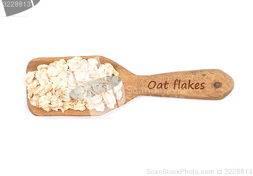 Image of Oat flakes on shovel