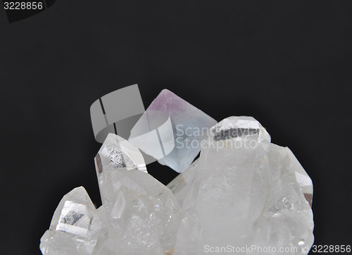 Image of Fluorite on rock crystal