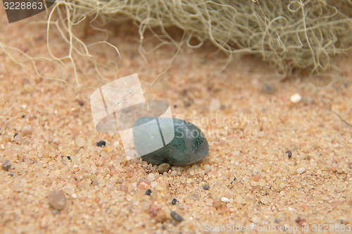 Image of Aquamarine on beach