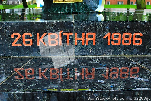 Image of the date of Chernobyl catastrophe on the stone