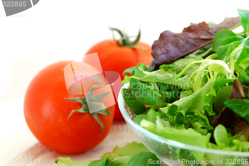 Image of Baby greens and tomatoes