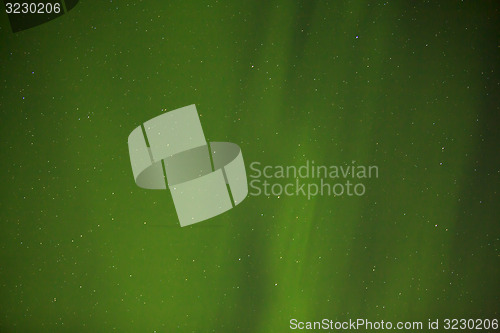 Image of Northern lights with bright stars in Iceland