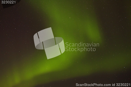 Image of Dynamic aurora with bright stars in Iceland