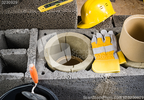 Image of Construction of modular ceramic chimney  