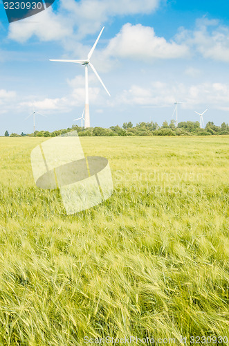 Image of Summer landscape with wind generators  