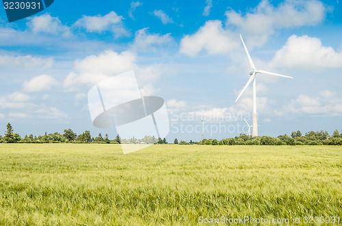 Image of Summer landscape with wind generators  