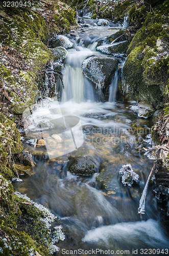 Image of Small creek with a waterfall  