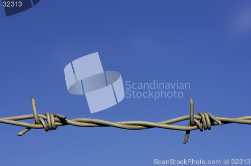 Image of Barbed wire fence detail