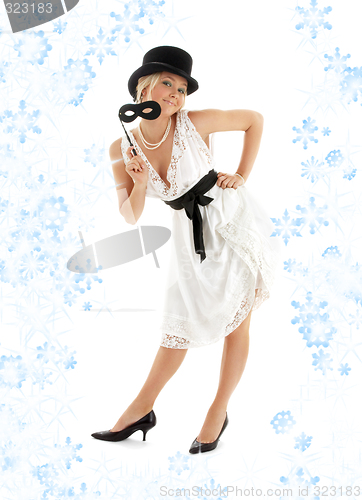 Image of pretty lady with black mask and snowflakes