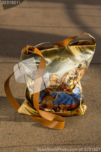 Image of women bag with color print 